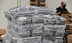 TOPSHOT - Mail-in ballots in their envelopes await processing at the Los Angeles County Registrar Recorders' mail-in ballot processing center at the Pomona Fairplex in Pomona, California, October 28, 2020. - Officials relocated mail-in ballot processing to the expansive location due to the need for COVID-19 social distancing for the ballot workers and the large number of mail-in ballots. While the tabulation of votes cast for Donald Trump and Joe Biden will begin when polls close on November 3 at 8pm, envelopes are now being sorted and signatures and ballots verified to expedite the tabulation process on November 3. (Photo by Robyn Beck / AFP)