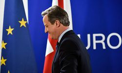 TOPSHOT - British Prime minister David Cameron leaves a press conference during an European Union summit on June 28, 2016 at the EU headquarters in Brussels. 
Britain's exit from the European Union may erode the bloc's leadership role in fighting climate change and stymie crucial efforts to set more ambitious targets for cutting greenhouse gases, officials and experts said on June 28. European leaders meeting in Brussels pressured British Prime Minister David Cameron Tuesday to launch the two-year withdrawal process "as soon as possible", but the embattled premier has vowed he will leave that task to a successor to be named on September 9. / AFP PHOTO / PHILIPPE HUGUEN