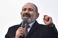 (FILES) In this file photo taken on February 25, 2021 Armenian Prime Minister Nikol Pashinyan addresses his supporters gathered on Republic Square in downtown Yerevan. - Armenian Prime Minister Nikol Pashinyan announced on March 28, 2021, that he will resign next month while staying in office until snap parliamentary elections due on June 20, as part of an effort to curb the political crisis gripping the Caucasus country. (Photo by Karen MINASYAN / AFP)