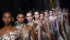 Models present creations by Elie Saab at the end of the 2019 Spring-Summer Haute Couture collection fashion show in Paris, on January 23, 2019. (Photo by Anne-Christine POUJOULAT / AFP)