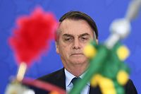 TOPSHOT - Brazilian President Jair Bolsonaro attends the new general officers' promotion ceremony at the Planalto Palace in Brasilia, on April 5, 2019. - Bolsonaro completes his first 100 days of government next April 10. (Photo by EVARISTO SA / AFP)