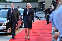 Britain's Prime Minister Theresa May speaks to journalists as she arrives at the Felsenreitschule prior to their informal dinner as part of the EU Informal Summit of Heads of State or Government in Salzburg, Austria on September 19, 2018. (Photo by JOE KLAMAR / AFP)