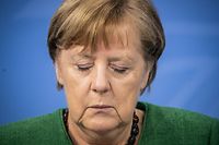 dpatopbilder - 23.03.2021, Berlin: Bundeskanzlerin Angela Merkel (CDU), nimmt an einer Pressekonferenz im Kanzleramt nach den Beratungen von Bund und Ländern teil. Der seit Monaten andauernde Lockdown in Deutschland wird angesichts steigender Corona-Infektionszahlen bis zum 18. April verlängert. Foto: Michael Kappeler/dpa/Pool/dpa +++ dpa-Bildfunk +++