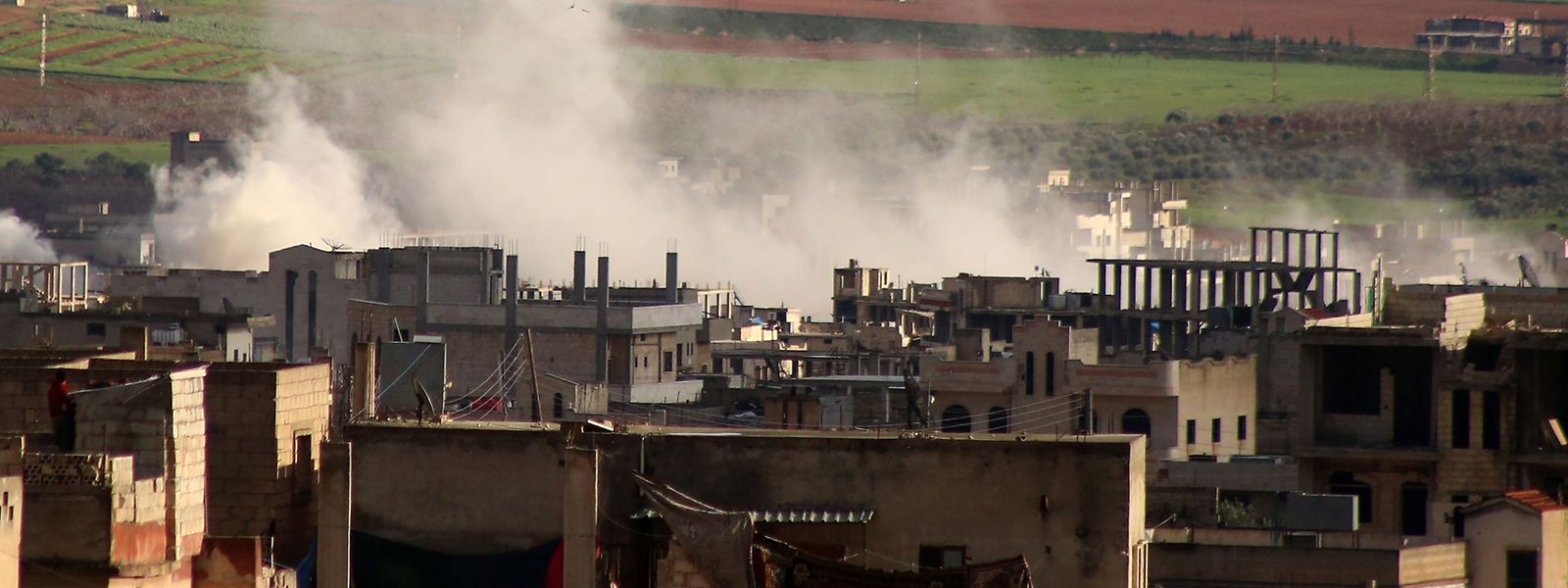 Rauch über Khan Sheikhun in der Idlib Provinz, die in Rebellenhand ist: Für Experten ist das Ende des Konflikts in Syrien noch fern.