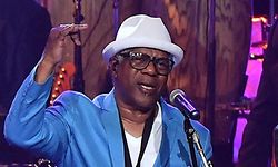 (FILES) In this file photo taken on June 14, 2018, US musicians Robert 'Kool' Bell (L), James 'JT' Taylor (2L), Ronald Bell (3rd from L) and Dennis Thomas (R) of Kool & The Gang  perform onstage during the Songwriters Hall of Fame 49th Annual Induction and Awards Dinner at New York Marriott Marquis Hotel in New York City. - Dennis "Dee Tee" Thomas, a co-founder of the legendary soul-funk band Kool and the Gang, whose hits included "Celebration," died on August 7, 021 at age 70, the group announced. (Photo by ANGELA WEISS / AFP)