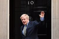 (FILES) In this file photo taken on December 13, 2019 Britain's Prime Minister and Conservative Party leader Boris Johnson arrives at 10 Downing Street in central London, following an audience with Britain's Queen Elizabeth II at Buckingham Palace, where she invited him to become Prime Minister and form a new government. - Britain's Prime Minister Johnson returned to Downing Street on April 26, 2020, after staying at his country residence Chequers, where he has been recuperating since his release from hospital on April 12, due to being diagnose with COVID-19. (Photo by Ben STANSALL / AFP)