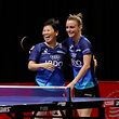 HOUSTON, TEXAS - NOVEMBER 25: Ni Xialian (L) and Sarah de Nutte of Luxembourg celebrate after winning the Women's Doubles round of 32 match against Liu Hsing-Yin and Cheng Hsien-Tzu of Chinese Taipei on day three of the 2021 World Table Tennis Championships Finals at the George R. Brown Convention Center on November 25, 2021 in Houston, Texas. (Photo by Liu Guanguan/China News Service via Getty Images)