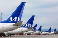 26.04.2019, Norwegen, Gardermoen: Flugzeuge der skandinavischen Fluggesellschaft SAS stehen am Terminal des Flughafens Gardermoen. Tausende Passagiere der skandinavischen Fluggesellschaft SAS waren von einem Pilotenstreik betroffen. Foto: Ole Berg-Rusten/NTB Scanpix/dpa +++ dpa-Bildfunk +++