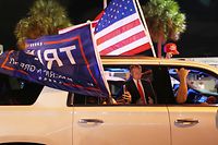 MIAMI, FLORIDA- NOVEMBER 03: Supporters of U.S. President Donald Trump drive past the Versailles restaurant as they await the results of the presidential election on November 03, 2020 in Miami, Florida. After a record-breaking early voting turnout, Americans head to the polls on the last day to cast their vote for incumbent U.S. President Donald Trump or Democratic nominee Joe Biden in the 2020 presidential election.   Joe Raedle/Getty Images/AFP
== FOR NEWSPAPERS, INTERNET, TELCOS & TELEVISION USE ONLY ==
