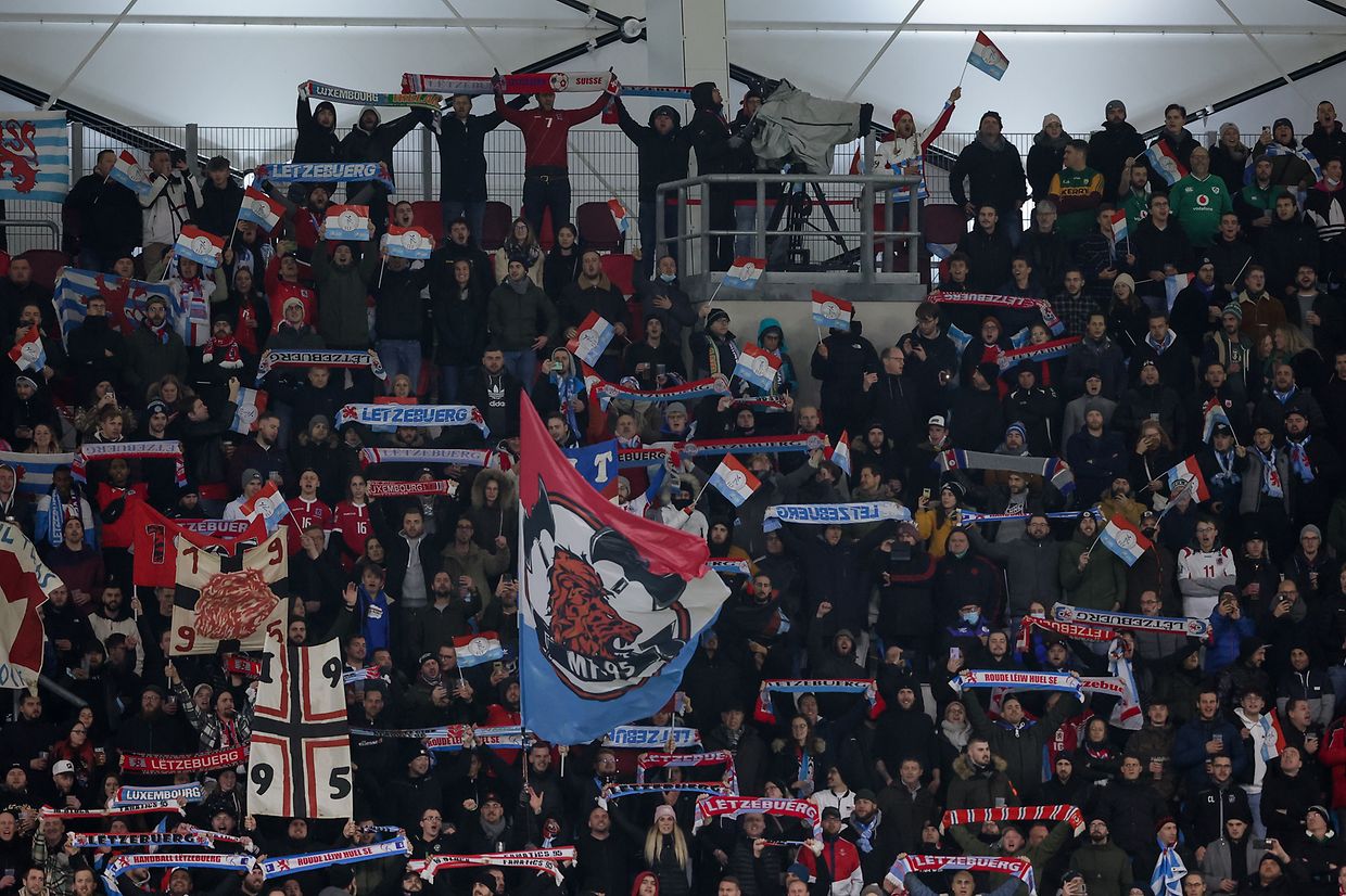 Flags and scarves as far as the eye can see.