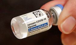 (FILES) In this file photo taken on March 5, 2021 registered nurse Florisa N. Lingad holds a Johnson & Johnson Janssen Covid-19 vaccine at a vaccination center established at the Hilton Chicago O'Hare Airport Hotel in Chicago, Illinois. - Up to 400 million doses of Johnson & Johnson's Covid-19 vaccine will be made available to African countries, the US pharmaceutical giant said on March 29, 2021.  The availability of the single-shot vaccine will be subject to national regulatory approvals in the African Union's 55 member states, with the first shipments expected to arrive in the third quarter of 2021. (Photo by KAMIL KRZACZYNSKI / AFP)