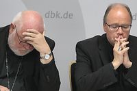Archbishop of Munich and Chairman of the German Bishops' Conference and Trier Bishop, Cardinal Reinhard Marx (L) and commissioner for sexual abuse issues in the ecclesiastical sphere, Stephan Ackermann give a press conference to present the results of the study on "Sexual Abuse of Minors by Catholic Priests, Deacons and Male Religious" (MHG study) on September 25, 2018 in Fulda, western Germany. - Germany's Catholic Church is due on September 25, 2018 to confess and apologise for thousands of cases of sexual abuse against children, part of a global scandal heaping pressure on the Vatican. It will release the latest in a series of reports on sexual crimes and cover-ups spanning decades that has shaken the largest Christian Church, from Europe to the United States, South America and Australia. (Photo by Daniel ROLAND / AFP)
