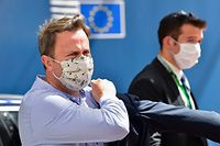 Luxembourg's Prime Minister Xavier Bettel leaves after an European Union Council in Brussels on July 19, 2020, over a post-virus economic rescue plan. - The EU has been plunged into a historic economic crunch by the coronavirus crisis, and EU officials have drawn up plans for a huge stimulus package to lead their countries out of lockdown. (Photo by JOHN THYS / various sources / AFP)