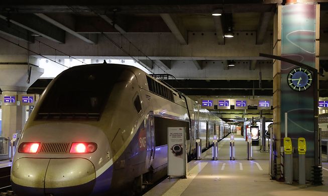 (FILES) In this file photo taken on April 8, 2018 a high speed TGV train stands at a platform at the Gare Montparnasse train station in Paris