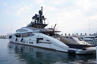 A picture taken on March 5, 2022 shows the yacht "Lady M", owned by Russian oligarch Alexei Mordashov, docked at Imperia's harbor. - Italian police seized the yacht on March 5, 2022 after the European Union targeted Mordashov and other Kremlin-linked oligarchs following Moscow's invasion of Ukraine. (Photo by Andrea BERNARDI / AFP)