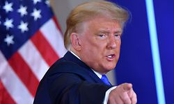 US President Donald Trump gestures after speaking during election night in the East Room of the White House in Washington, DC, early on November 4, 2020. (Photo by MANDEL NGAN / AFP)