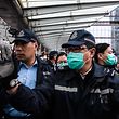 Police attempt to disperse a "flash mob" gathering to demand the government close its border with mainland China to reduce the spread of the deadly SARS-like virus to Hong Kong on February 3, 2020. - Hundreds of Hong Kong medical workers walked off their jobs on February 3, demanding the city close its border with China to reduce the coronavirus spreading -- with frontline staff threatening to follow suit in the coming days. (Photo by Anthony WALLACE / AFP)