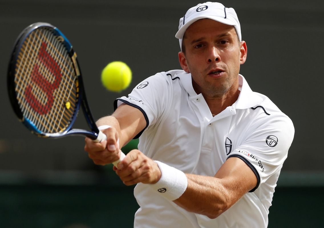  Luxembourg’s Gilles Muller in action during his fourth round match against Spain’s Rafael Nadal 