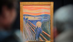 People view the Norwegian artist Edvard Munch's 1895 pastel on board work entitled 'The Scream' at Sotheby's auction house in central London on April 12, 2012. The work is expected to fetch around 80 million USD (around 50 million GBP) when it is auctioned at the Impressionist and Modern Art Evening sale in New York on May 2, 2012.     AFP PHOTO/ TOPSHOTS/ CARL COURT
