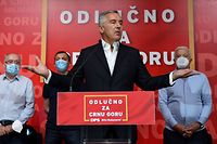 Montenegro's President Milo Djukanovic, leader of the Democratic Party of Socialists (DPS), addresses the media at his party headquarters after the general election in Podgorica, early on August 31, 2020. - Montenegro's ruling party was a hair ahead of the main pro-Serb opposition alliance in a hotly-fought election on August 30 that left both sides without a full majority, a preliminary exit poll showed, portending uncertain coalition talks for the Adriatic nation. With little over a third of the vote share, the Democratic Party of Socialists (DPS) led by President Milo Djukanovic -- in power for some three decades -- looked set for its worst electoral showing in history. (Photo by SAVO PRELEVIC / AFP)