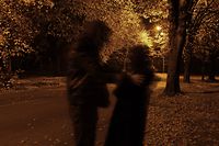 attack on the street during night time, note added grain