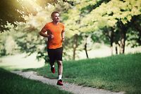 Foto stock-photo-active-healthy-runner-jogging-outdoor-648750601