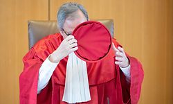 The chairman of the German constitutional court Andreas�Vosskuhle speaks on May 5, 2020 at the Constitutional court in Karlsruhe, to give out the court's ruling that the European Central Bank must clarify a key bond-buying scheme to support the eurozone economy is "proportionate" or else Germany's Bundesbank central bank may no longer participate. - The Bundesbank will be barred from participating in the "quantitative easing" (QE) asset purchase programme in three months' time "unless the ECB Governing Council adopts a new decision that demonstrates in a comprehensible and substantiated manner that the monetary policy objectives pursued by the ECB are not disproportionate," the court said in a statement. (Photo by Sebastian Gollnow / POOL / AFP)