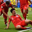 England's defender Harry Maguire (R) celebrates with England's defender John Stones after scoring the opener during the Russia 2018 World Cup quarter-final football match between Sweden and England at the Samara Arena in Samara on July 7, 2018. / AFP PHOTO / Fabrice COFFRINI / RESTRICTED TO EDITORIAL USE - NO MOBILE PUSH ALERTS/DOWNLOADS
