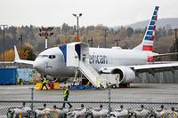 Boeing 737 MAX airliner with American Airlines markings is pictured on the ramp at Renton Airport adjacent to the Boeing Renton Factory in Renton, Washington on November 10, 2020. - Boeing said November 10, 2020 it was hit with another 12 cancelled orders for the 737 MAX, as the flagship aircraft is close to returning to the skies after being grounded since March 2019 following two deadly crashes. (Photo by Jason Redmond / AFP)