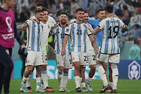 (FromL) Argentina's midfielder #07 Rodrigo De Paul, Argentina's forward #22 Lautaro Martinez, Argentina's forward #10 Lionel Messi, Argentina's forward #21 Paulo Dybala, Argentina's midfielder #20 Alexis Mac Allister, Argentina's midfielder #05 Leandro Paredes and Argentina's defender #19 Nicolas Otamendi celebrate winning the Qatar 2022 World Cup football semi-final match between Argentina and Croatia at Lusail Stadium in Lusail, north of Doha on December 13, 2022. (Photo by JACK GUEZ / AFP)