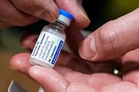 A picture taken on April 12, 2021 shows a phial of Johnson & Johnson Janssen Covid-19 vaccine as the first doses proceeding from the Dutch city of Leiden are stored at the Movianto distribution center in Oss. - Johnson & Johnson Janssen Covid-19 vaccine is the fourth corona vaccine that will become available in the Netherlands. (Photo by ROB ENGELAAR / ANP / AFP) / Netherlands OUT