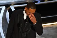 (FILES) In this file photo taken on March 27, 2022 US actor Will Smith accepts the award for Best Actor in a Leading Role for "King Richard" onstage during the 94th Oscars at the Dolby Theatre in Hollywood, California. - Will Smith has tendered his resignation from the body that awards the Oscars after his attack on Chris Rock during the weekend ceremony, a statement said April 1, 2022. (Photo by Robyn Beck / AFP)