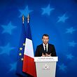 TOPSHOT - French President Emmanuel Macron speaks to the press at the end of the EU leaders' summit at the building Council of the EU, in Brussels on October 20, 2017.
EU leaders agreed to start internal work on the bloc's relationship with Britain after Brexit, giving some progress for embattled Prime Minister Theresa May to take back home. / AFP PHOTO / JOHN THYS