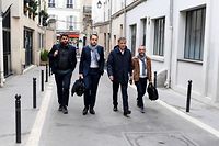 French Socialist Party (PS) first secretary Olivier Faure (2nd R) and PS members Sebastien Vincini (R), Pierre Jouvet (2nd L), arrive at the headquarters of the leftist movement La France Insoumise (LFI) to attend a meeting as part of the ongoing negociations to patch together with the communists and ecologists an alliance ahead of June parliamentary elections in Paris on May 2, 2022. (Photo by Alain JOCARD / AFP)