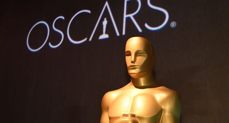 (FILES) In this file photo the Oscar statue watches over the 91st Oscars Nominees Luncheon at the Beverly Hilton hotel on February 4, 2019 in Beverly Hills. - Streaming films like "Mank" and "The Trial of the Chicago 7" will battle with frontrunner "Nomadland" for the March 15, 2021 coveted Oscar nominations, setting up the grand finale to an awards season transformed by the pandemic. With most US movie theaters closed all year due to Covid, the Academy Awards have been delayed to their latest-ever date -- April 25 -- while several big-screen studio blockbusters skipped their 2020 releases entirely, leaving an eclectic field of hopefuls. (Photo by Robyn Beck / AFP)