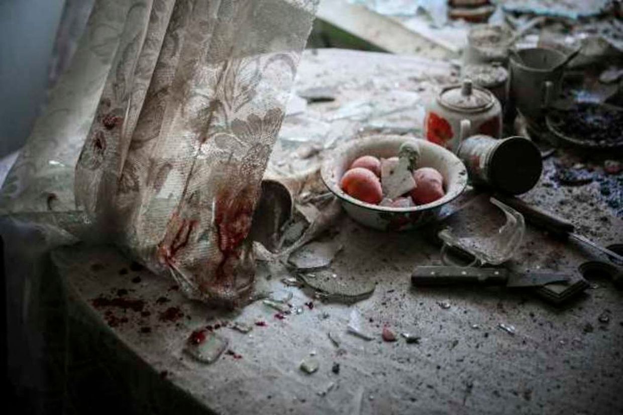 First Prize in the General News Category, Singles
Dans une cuisine à Donetsk, photo du 26 août 2014. Cette photo du photographe russe Sergei Ilnitsky a remporté le premier prix du World Press photo, dans la catégorie General News.