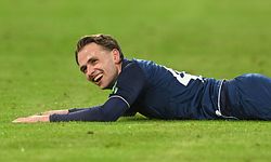 Cologne's Luxembourger midfielder Mathias Olesen lays on the pitch during the German first division Bundesliga football match between Bayern Munich and FC Cologne in Munich, southern Germany, on January 24, 2023. (Photo by CHRISTOF STACHE / AFP) / DFL REGULATIONS PROHIBIT ANY USE OF PHOTOGRAPHS AS IMAGE SEQUENCES AND/OR QUASI-VIDEO