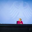 (FILES) In this file photo taken on March 4, 2021 German Chancellor Angela Merkel (C), Bavarian state governor Markus Soeder (R) and the Mayor of Berlin Michael Mueller (L) deliver a press conference following talks via video conference with Germany's state premiers on the extension of the current Covid-19 restrictions, at the Chancellery in Berlin. - Germany is poised to tighten a partial lockdown into April to halt an exponential spread of the coronavirus driven by variants. Europe's biggest economy had progressively began easing restrictions, first reopening schools in late February, before allowing some shops to resume business in March. But hopes for indoor dining, cultural and leisure facilities to follow suit will now have to be delayed, as a third wave of the virus has sent infections numbers rising again. (Photo by Markus Schreiber / POOL / AFP)