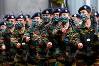 Belgian crown Princess Elisabeth (2R) takes part in the Blue Berets parade in which the first-year students of the Royal Military Academy, who successfully completed the military initiation phase, wear a blue beret, in Brussels, on September 25, 2020. - Crown Princess Elisabeth is a first-year student at the Royal Military Academy (KMS-ERM - Ecole Royale Militaire), this year. (Photo by THIERRY ROGE / BELGA / AFP) / Belgium OUT