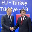 EU-Ratspräsident Donald Tusk und der türkische Premierminister Ahmet Davutoglu haben eine Lösung gefunden.