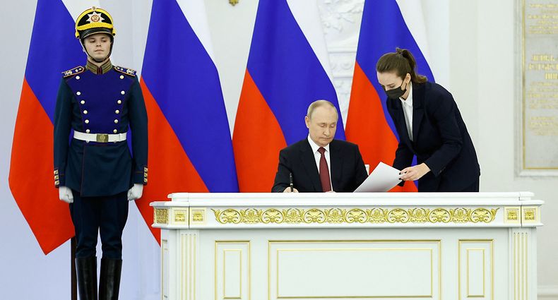 Russian President Vladimir Putin attends a ceremony to sign treaties formally annexing four regions of Ukraine Russian troops occupy - Lugansk, Donetsk, Kherson and Zaporizhzhia, at the Kremlin in Moscow on September 30, 2022. (Photo by Dmitry ASTAKHOV / SPUTNIK / AFP)
