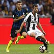 Inter Milan's forward Mauro Emanuel Icardi from Argentina (L) vies with Juventus' midfielder Miralem Pjanic of Bosnia-Herzegovina during the Italian Serie A football match Inter Milan vs Juventus on September 18, 2016 at the 'San Siro Stadium' in Milan. / AFP PHOTO / MARCO BERTORELLO