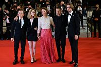 (FromL) British actor Tim Roth, French director Mia Hansen-Love, Luxembourg actress Vicky Krieps, Norwegian actor Anders Danielsen Lie and Swedish actor Hampus Nordenson pose as they arrive for the screening of the film "Bergman Island" at the 74th edition of the Cannes Film Festival in Cannes, southern France, on July 11, 2021. (Photo by Christophe SIMON / AFP)