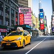 NEW YORK, NY - MARCH 26: A taxi drives down Times Square on March 26, 2020 in New York City. Most cabdrivers are fearful of being exposed to the coronavirus that they prefer to stay home with no way to pay bills, while across the country schools, businesses and places of work have either been shut down or are restricting hours of operation as health officials try to slow the spread of COVID-19.   Eduardo Munoz Alvarez/Getty Images/AFP
== FOR NEWSPAPERS, INTERNET, TELCOS & TELEVISION USE ONLY ==
