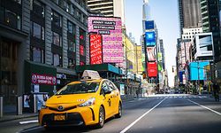 NEW YORK, NY - MARCH 26: A taxi drives down Times Square on March 26, 2020 in New York City. Most cabdrivers are fearful of being exposed to the coronavirus that they prefer to stay home with no way to pay bills, while across the country schools, businesses and places of work have either been shut down or are restricting hours of operation as health officials try to slow the spread of COVID-19.   Eduardo Munoz Alvarez/Getty Images/AFP
== FOR NEWSPAPERS, INTERNET, TELCOS & TELEVISION USE ONLY ==
