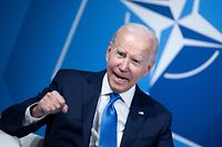 US President Joe Biden speaks ahead of a meeting with NATO Secretary General Jens Stoltenberg during the NATO summit at the Ifema congress centre in Madrid, on June 29, 2022. (Photo by Brendan Smialowski / AFP)