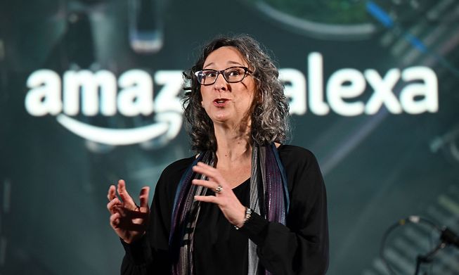 Amazon executive Arianne Walker speaks on Wednesday at the Consumer Electronics Show in Las Vegas, Nevada, about the company's smart speaker and other products. That Amazon segment has seen sharp job cuts in recent weeks.