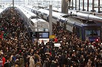 Commuters stand on a crowded platform of the Gare de Lyon railway station on April 3, 2018 in Paris, on the first day of a two days strike.
Staff at state rail operator SNCF walked off the job from 7.00 pm (1700 GMT) on April 2, the first in a series of walkouts affecting everything from energy to garbage collection. The rolling rail strikes, set to last until June 28, are being seen as the biggest challenge yet to the President's sweeping plans to shake up France and make it more competitive. / AFP PHOTO / ludovic MARIN