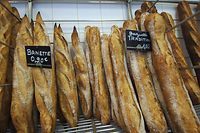 (FILES) This file photo taken on August 27, 2007, shows baguette breads on display at a bakery in Caen, western France, as bread prices in France increase due to higher wheat prices. - The French baguette was given UNESCO World Heritage status on November 29, 2022, as the UN agency granted "intangible cultural heritage status" to the tradition of making the baguette and the lifestyle that surrounds them. (Photo by MYCHELE DANIAU / AFP)
