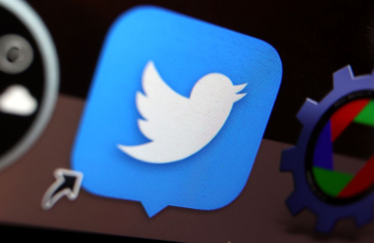 An undated photo of the Twitter logo on display.